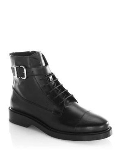 Shop Tod's Buckle Combat Boots In Black