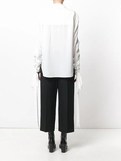 Shop Jw Anderson Lace Up Sleeve Blouse