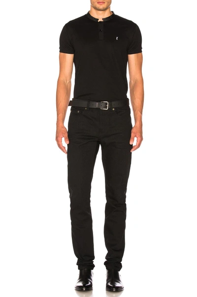 Shop Saint Laurent Low Rise Skinny Jeans In Black