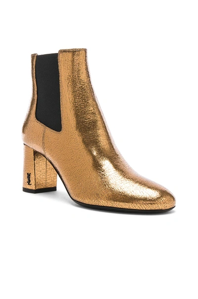 Shop Saint Laurent Cracked Metallic Leather Loulou Pin Boots In Metallics