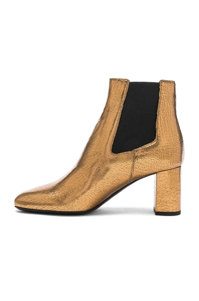 Shop Saint Laurent Cracked Metallic Leather Loulou Pin Boots In Metallics