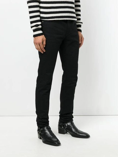 Shop Saint Laurent Classic Fitted Skinny Jeans - Black