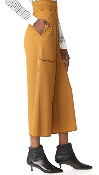 Shop See By Chloé Cropped Wide Leg Trousers In Gold