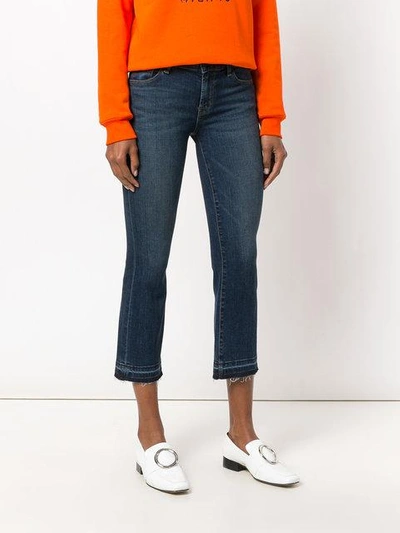 Shop J Brand Faded Cropped Bootcut Jeans In Blue