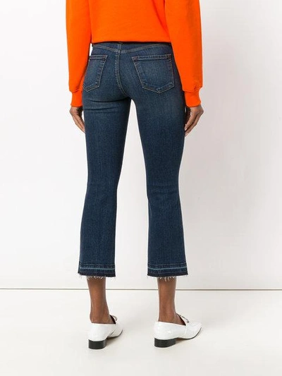 Shop J Brand Faded Cropped Bootcut Jeans In Blue