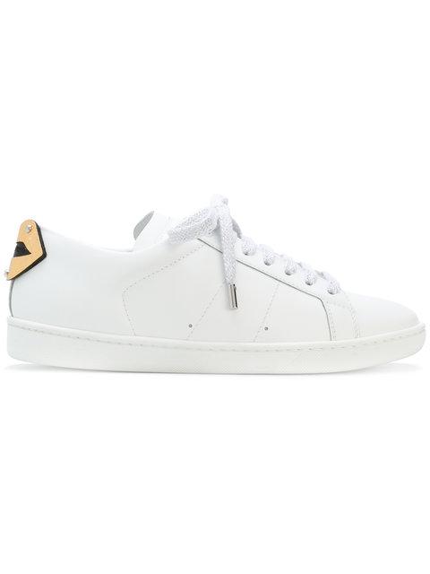 silver and gold sneakers