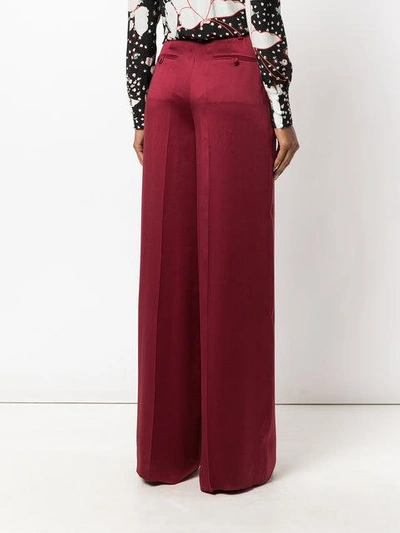 Shop Valentino Tied Palazzo Pants In Red