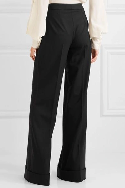Shop Dolce & Gabbana Stretch Wool-blend Flared Pants In Black