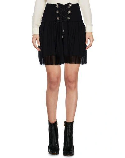 Shop Versus Mini Skirt In Black