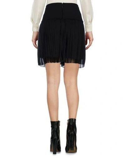 Shop Versus Mini Skirt In Black