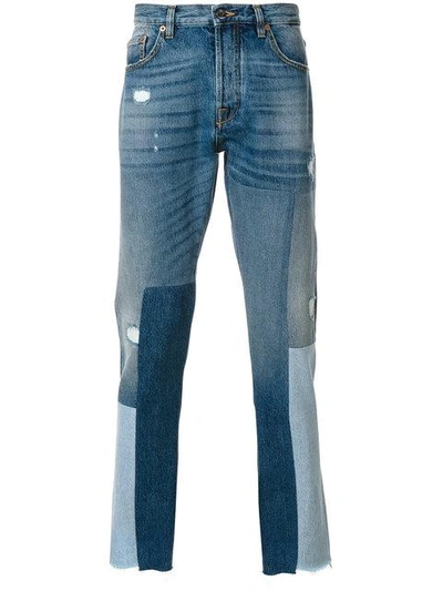Valentino Destroyed Patchwork Slim Leg Jeans In Blue In Blue Multi