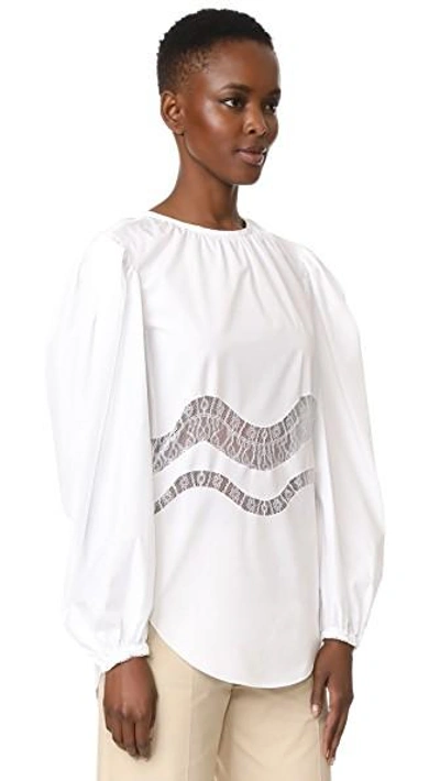 Shop Nina Ricci Long Sleeve Top In White