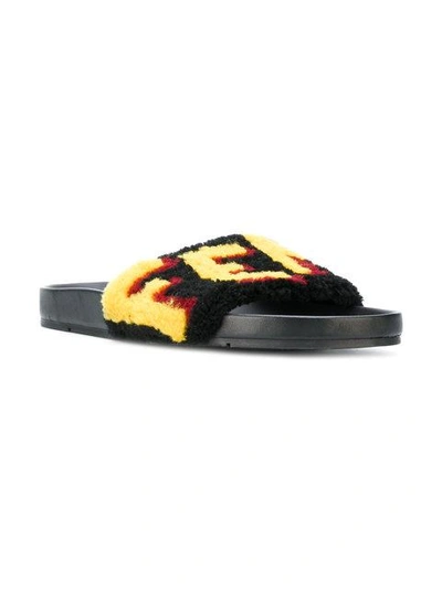 Shop Fendi Shearling Logo Slides