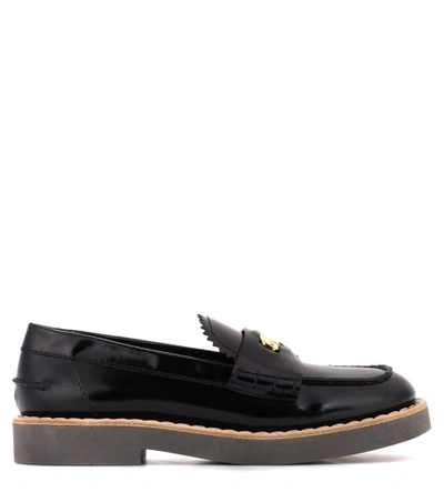 Shop Miu Miu Glossed Leather Loafers In Black