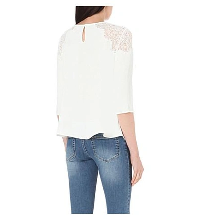 Shop Claudie Pierlot Biche Crepe And Lace Top In Blanc