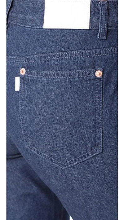 Shop Sjyp Bottom Bias Cutoff Jeans In Dark Blue