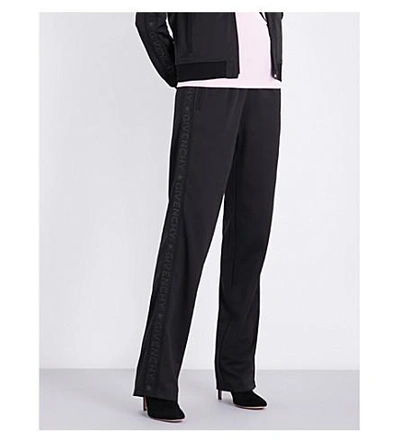 Shop Givenchy Wide Mid-rise Jersey Track Pants In Black