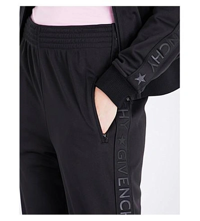 Shop Givenchy Wide Mid-rise Jersey Track Pants In Black