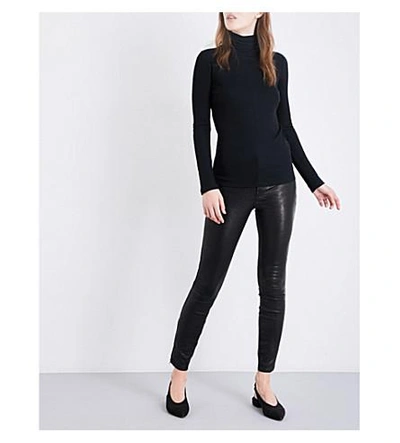 Shop Vince Turtleneck Ribbed Jersey Top In Black