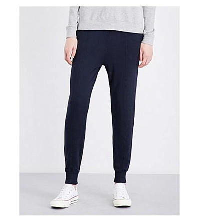 Shop Clu Tapered Relaxed-fit Jersey Track Pants In Navy