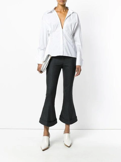 Shop Jacquemus Flared Cropped Trousers