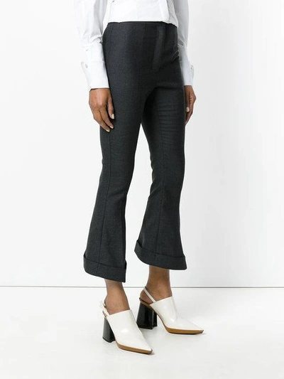 Shop Jacquemus Flared Cropped Trousers