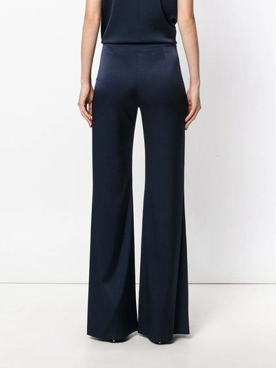 Shop Galvan High-waisted Flared Trousers In Blue