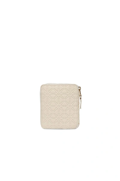 Comme Des Garçons Star Embossed Zip Fold Wallet In Off White