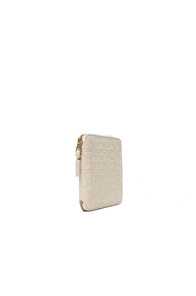 Shop Comme Des Garçons Star Embossed Zip Fold Wallet In Off White