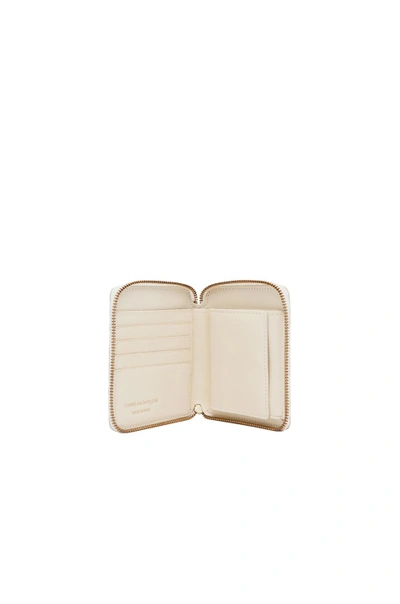 Shop Comme Des Garçons Star Embossed Zip Fold Wallet In Off White