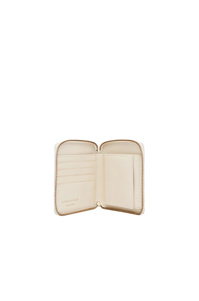 Comme Des Garçons Star Embossed Zip Fold Wallet In Off White