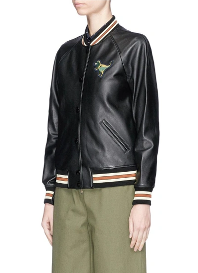Shop Coach Rexy Patch Lambskin Leather Varsity Jacket