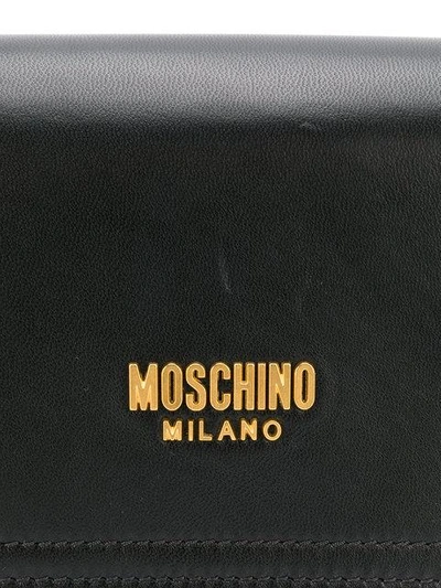 Shop Moschino Printed Logo Clutch Bag In 3055