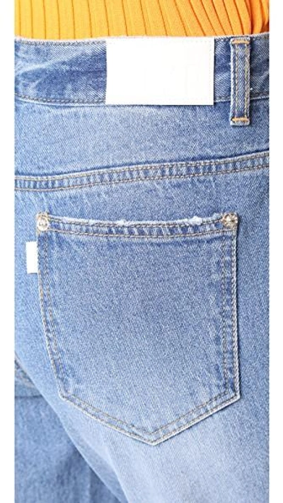 Shop Sjyp Back Strap Detail Jeans In Denim Blue