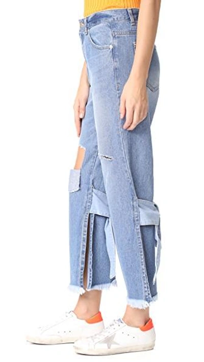 Shop Sjyp Back Strap Detail Jeans In Denim Blue