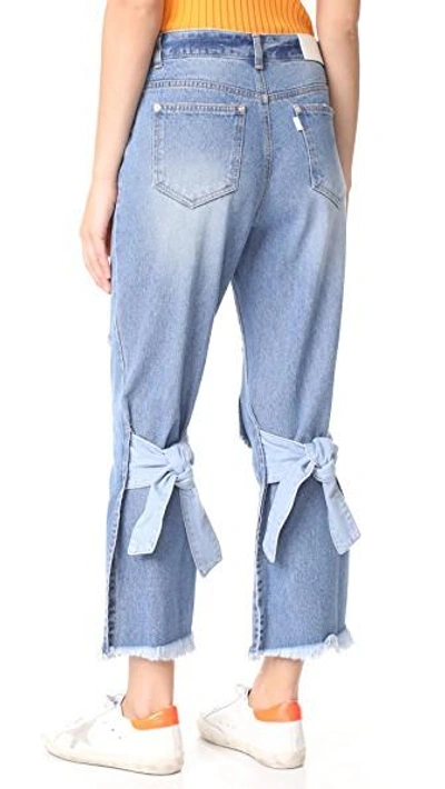 Shop Sjyp Back Strap Detail Jeans In Denim Blue