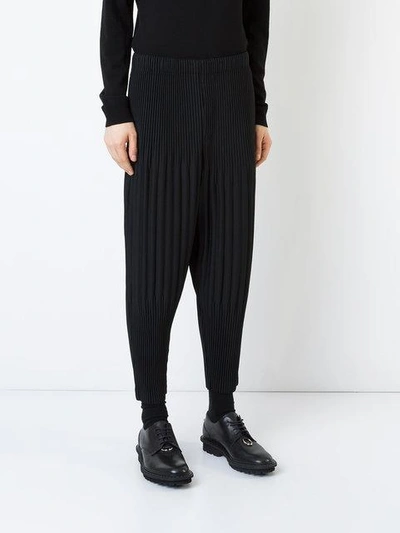 Shop Issey Miyake Pleated Trousers In Black