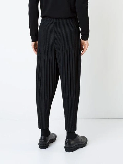 Shop Issey Miyake Pleated Trousers In Black