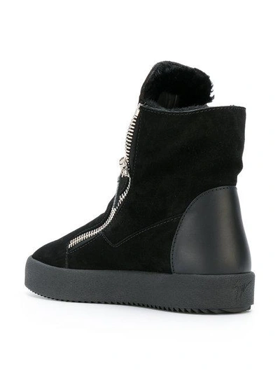 Shop Giuseppe Zanotti Shearling Lined Hi-top Sneakers In Black