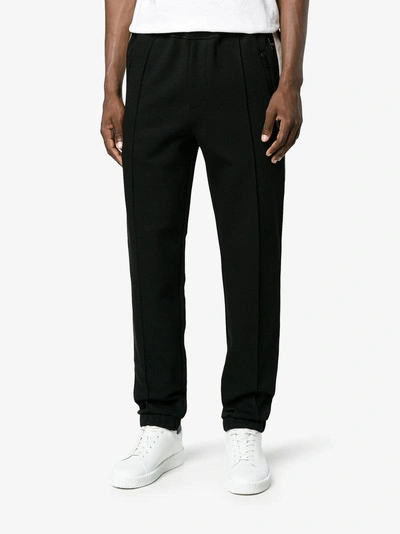 Shop Fendi White Stripe Track Pants In Black