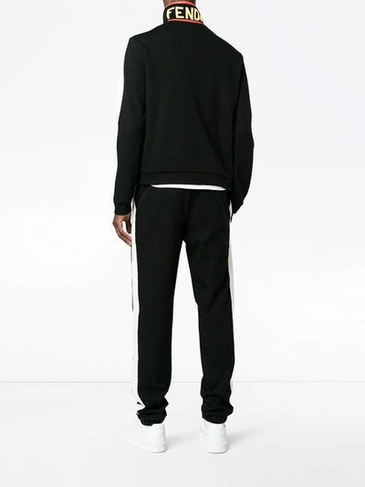 Shop Fendi White Stripe Track Pants - Black