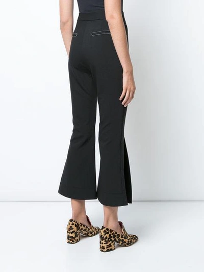 Shop Ellery Cropped Trousers With Flare In Black