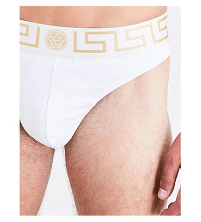 Shop Versace Iconic Stretch-cotton Thong In White Gold