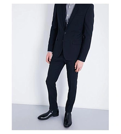 Shop Sandro Tapered Slim-fit Wool Pants In Navy Blue
