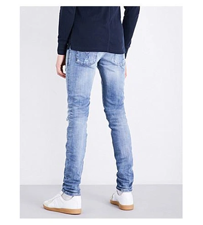 Shop Diesel Sleenker Distressed Skinny Mid-rise Stretch-denim Jeans In Light Wash Blue