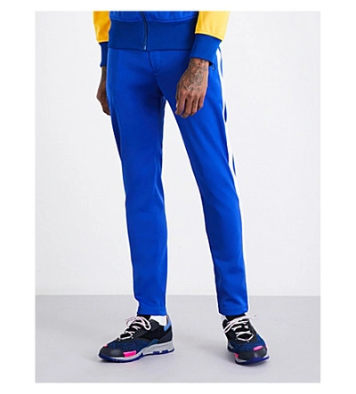 Junya Watanabe Contrast-trim Skinny Mid-rise Jersey Jogging Bottoms In Blue Yellow