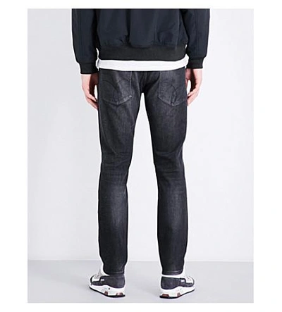 Shop Calvin Klein Slim-fit Tapered Stretch-denim Jeans In Black Jack Destructed
