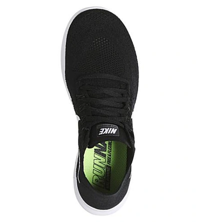 Shop Nike Free Run 2 Flyknit Sneakers In Black White Grey