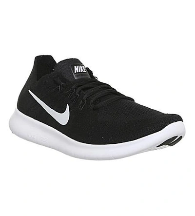 Shop Nike Free Run 2 Flyknit Sneakers In Black White Grey