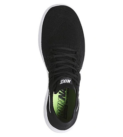 Shop Nike Free Run 2 Flyknit Trainers In Black White